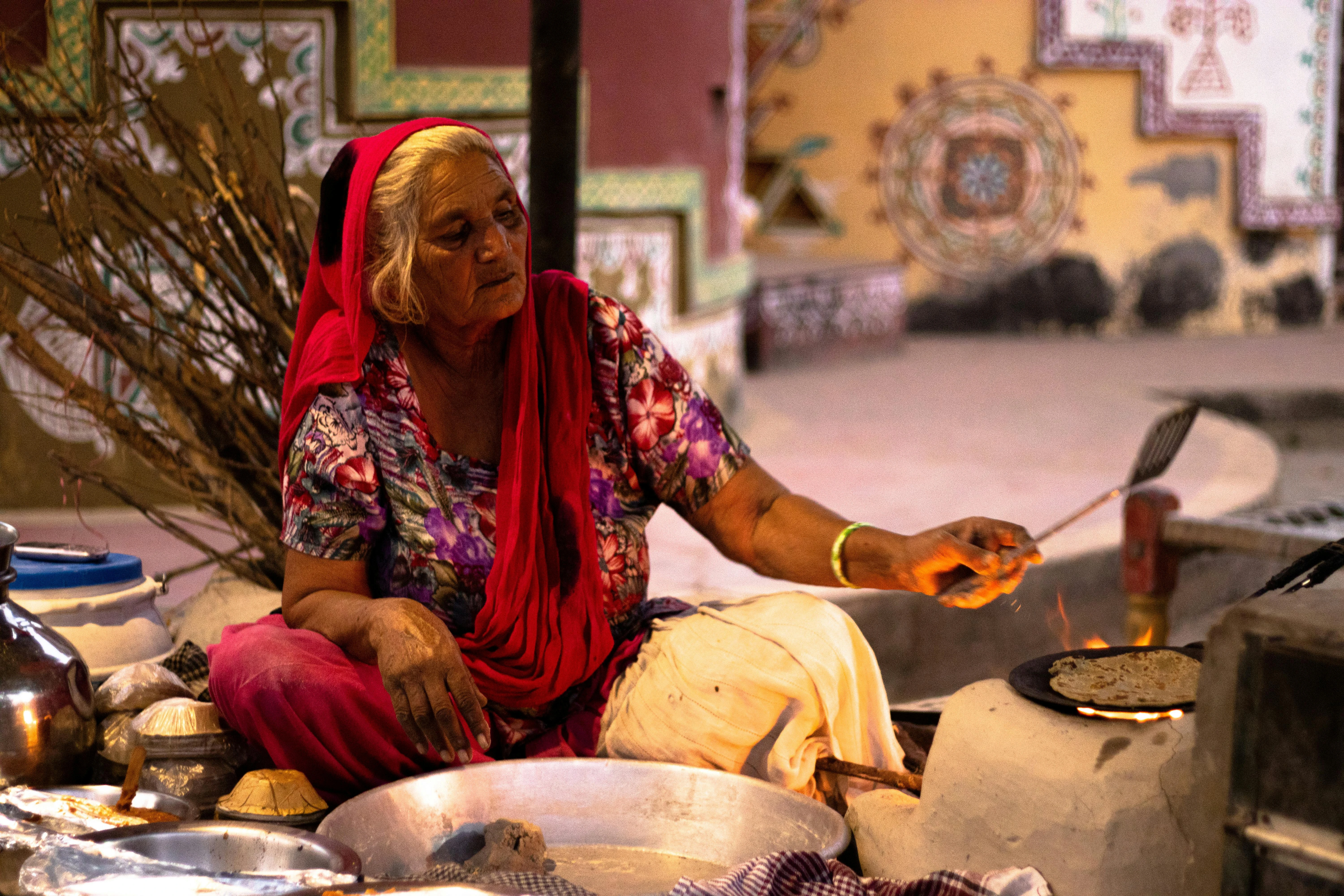 Maharashtrian Bhakri being cooked on traditional wood fire chulha